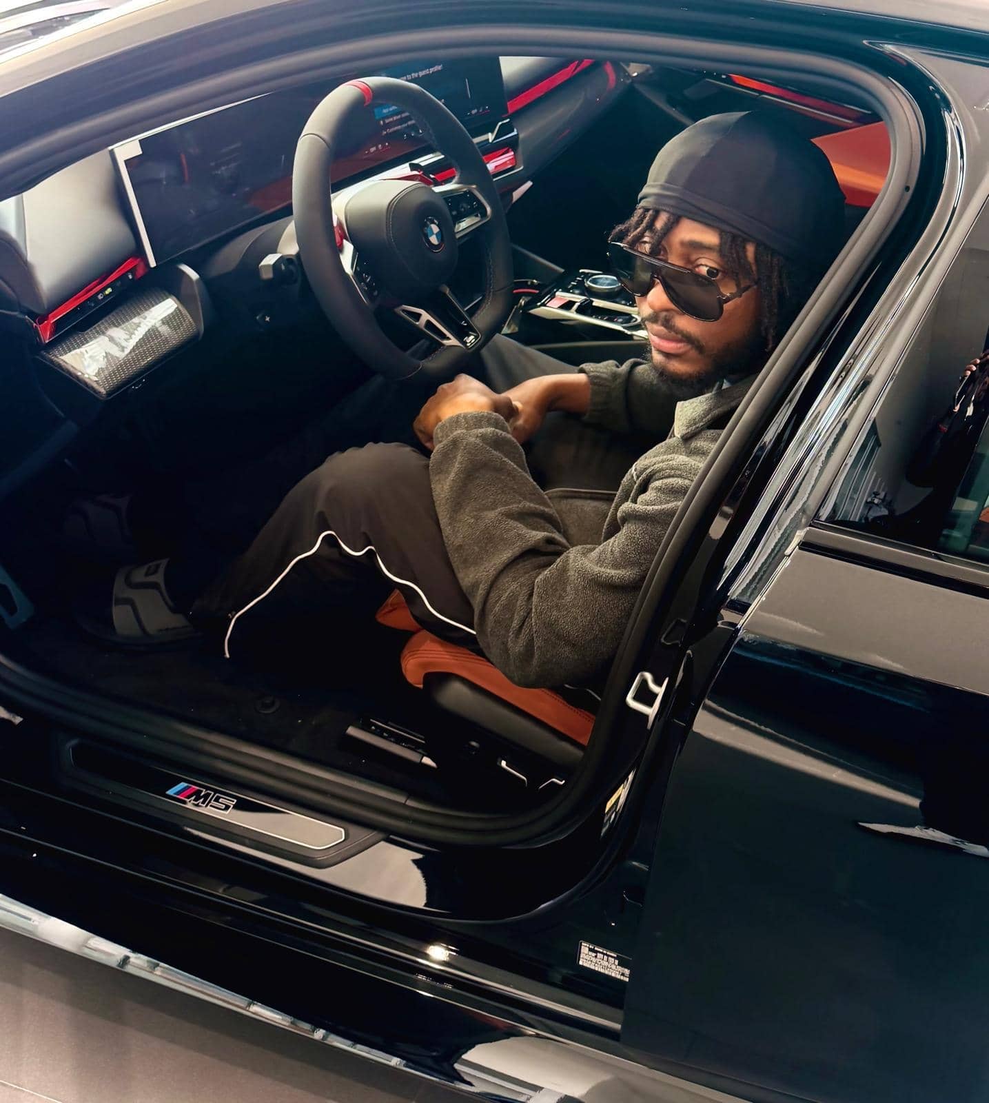 Danny Dan inside a car